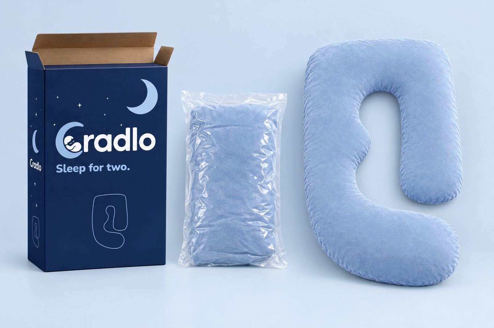 The Cradlo retail box, the vacuum-sealed pillow and the pillow fully expanded